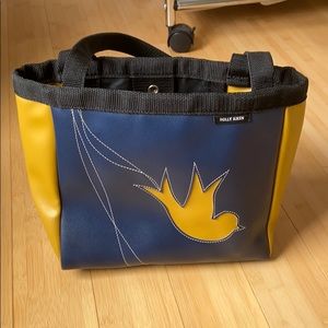 Holly Aiken coupe tote bag with bird design.